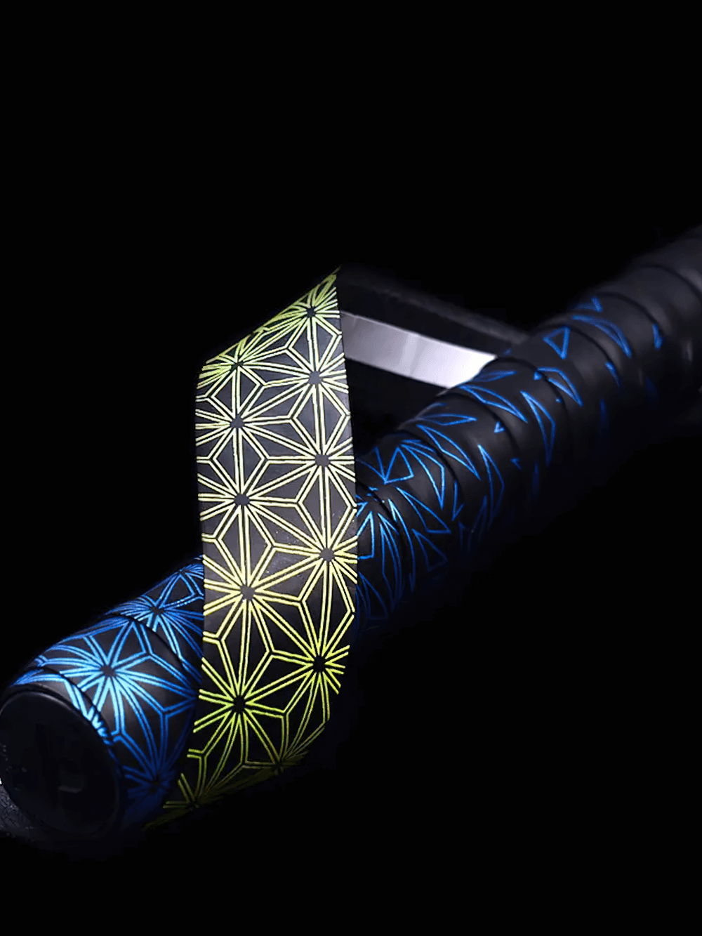 Close-up of Anti-Slip Racket Grip Tape for Tennis Squash - SF3481 with vibrant pattern and texture for enhanced grip and control.